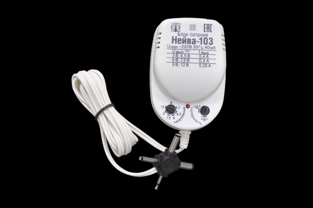 Блок питания универсальный Нейва-103 3-4.5V-0.4A/6-7.5V-0.3A/9-12V-0.25A смена +/-